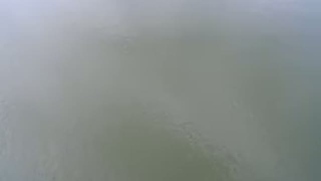 HIDDEN LAKE COLORADO-2016: Plane Flying Above Sea River Or Lake With Reflection