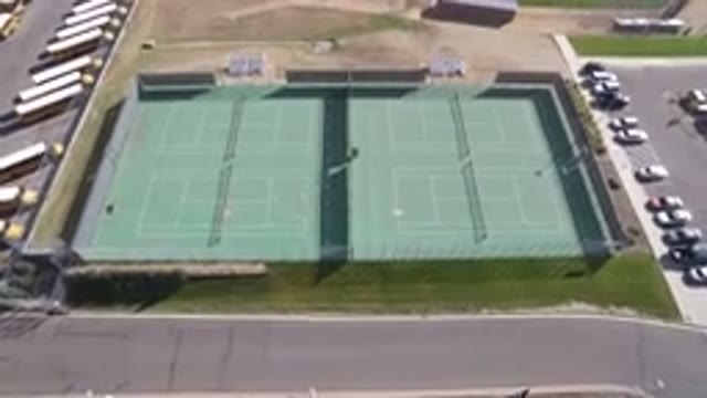 HIDDEN LAKE COLORADO-2016: The Green Tennis Court Seen With The Parking Lot From