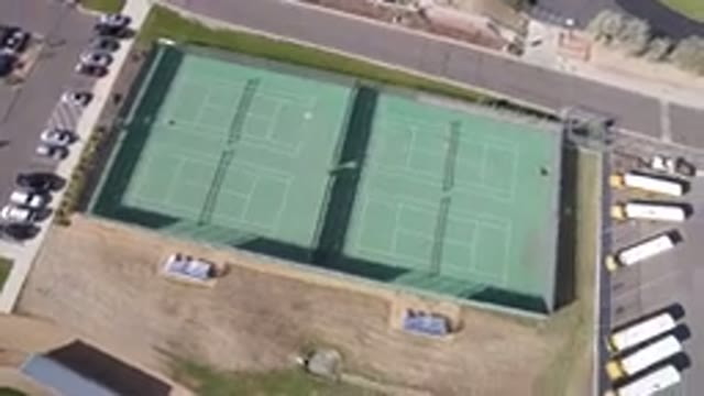 HIDDEN LAKE COLORADO-2016: An Aerial View Of A Tennis Court And Parking Lot