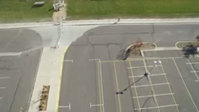 HIDDEN LAKE COLORADO-2016: Gray Car-Free Parking Person Walking Empty Streets