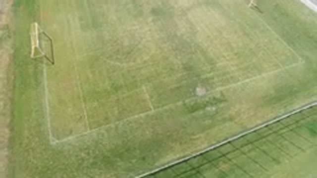 HIDDEN LAKE COLORADO-2016: Aerial View Of A Soccer Field With Green Grass White Markings