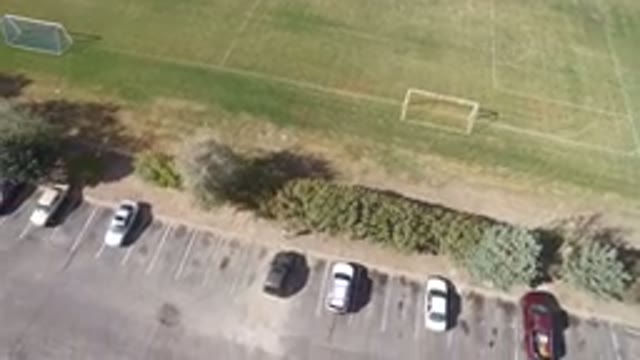 HIDDEN LAKE COLORADO-2016: A Beautiful Aerial View Of A Parking Lot With A Few Cars
