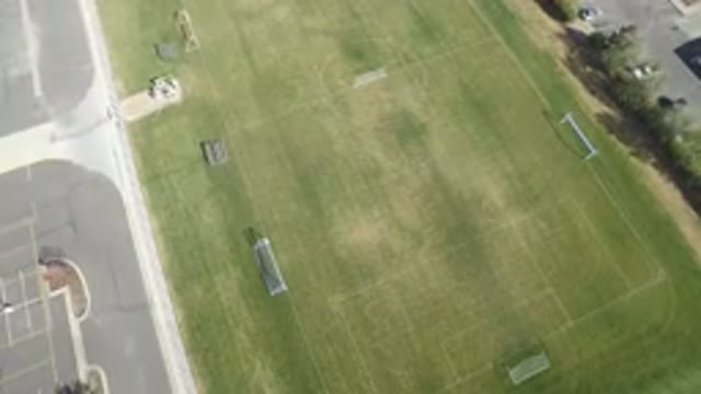 HIDDEN LAKE COLORADO-2016: Aerial View Football Field Without People Green Lawn