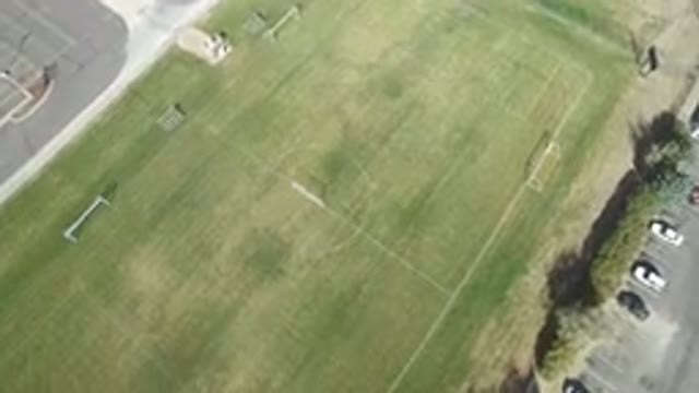 HIDDEN LAKE COLORADO-2016: Aerial View Of A Grassy Field For Sports There Are