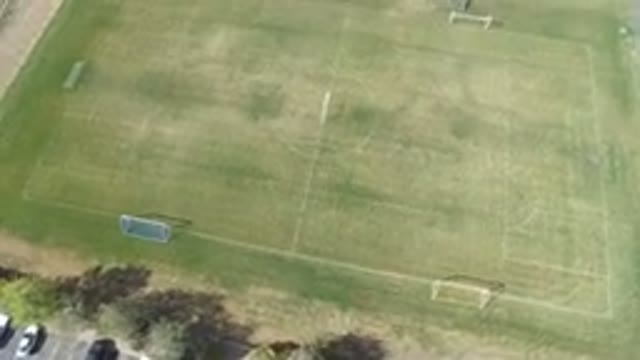 HIDDEN LAKE COLORADO-2016: A Football Field With A Parking Lot Nearby And A Few