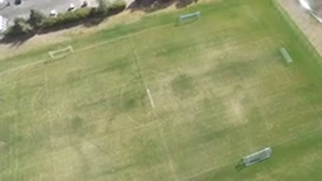 HIDDEN LAKE COLORADO-2016: Aerial View Of An Empty Football Field And A Parking Lot