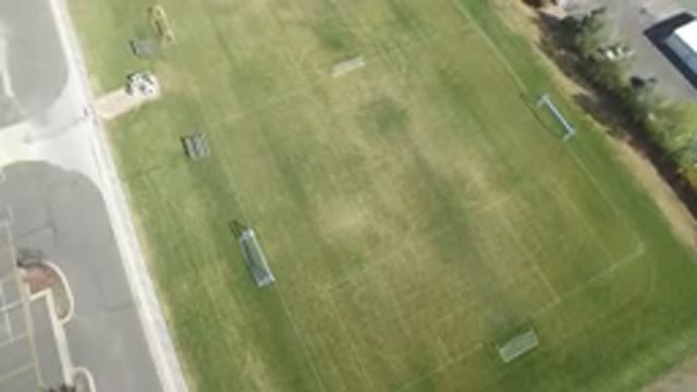 HIDDEN LAKE COLORADO-2016: An Aerial View Of A Grassy Green Field And There Is A