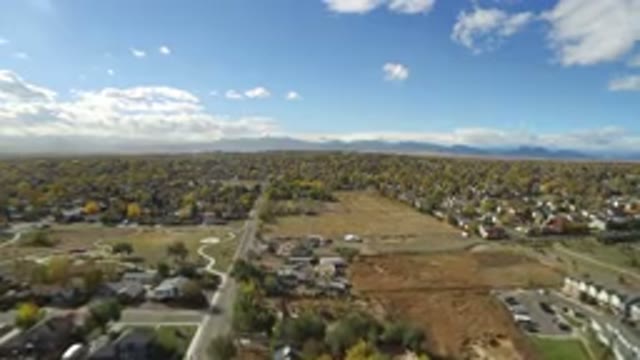 HIDDEN LAKE COLORADO-2016: A Top View Of Buildings Flowers Road And Cars In A