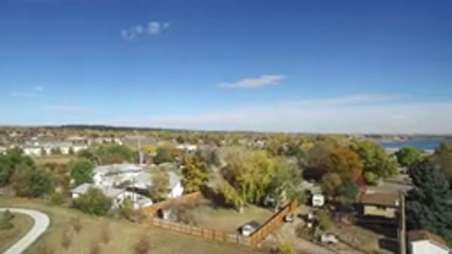 HIDDEN LAKE COLORADO-2016: Drone Aerial of Cottage in Suburban Area with Lake