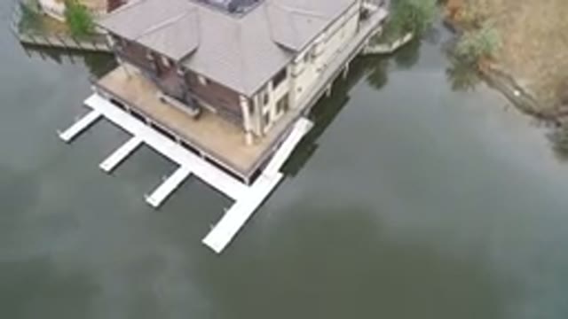 HIDDEN LAKE COLORADO-2016: Drone Shot Of A Beautiful House On A Lake Or Pond