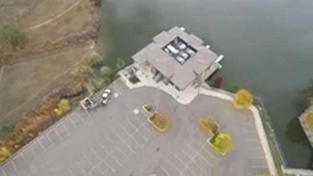 HIDDEN LAKE COLORADO-2016: An Aerial View Of A Parking Lot And Building Next To