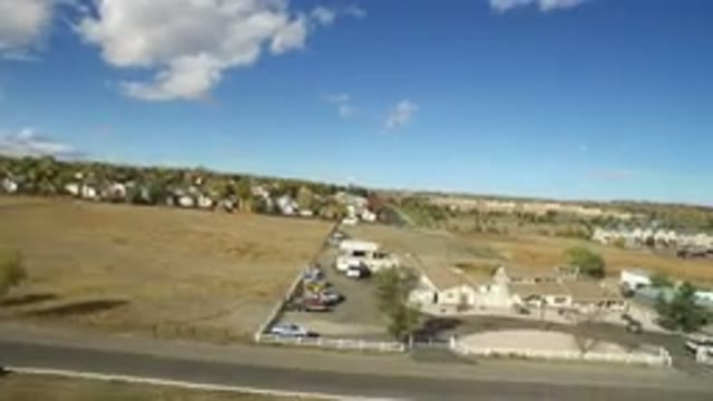 HIDDEN LAKE COLORADO-2016: Cars Parked In The Center Of A Quiet Empty Village