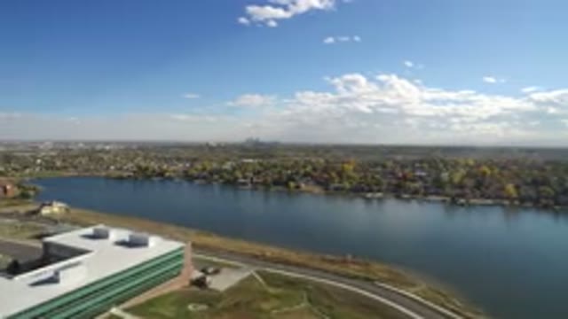HIDDEN LAKE COLORADO-2016: Modern Building With Open Areas Around Near A Water