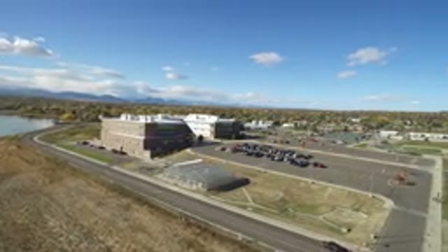 HIDDEN LAKE COLORADO-2016: Drone View Showing Cars In Parking Lot And Two