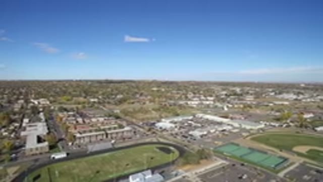 HIDDEN LAKE COLORADO-2016: Aerial View Of A City Shows The Football Field The