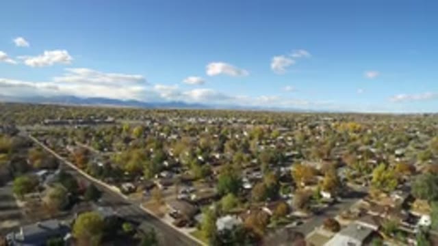 HIDDEN LAKE COLORADO-2016: View Of City In Nature During Daytime With Hoses And Houses