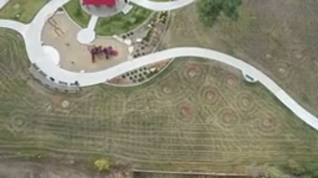 HIDDEN LAKE COLORADO-2016: An Aerial View Of Concrete Walkways Through A Field
