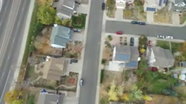 HIDDEN LAKE COLORADO-2016: The View Of A Part Of A Busy Avenue And A Residential