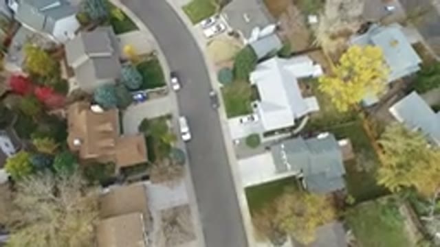 HIDDEN LAKE COLORADO-2016: Camera Panning Over Neighborhood With Green Trees And