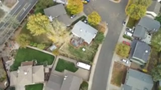 HIDDEN LAKE COLORADO-2016: Aerial View Of A Street With House Scars And Trees