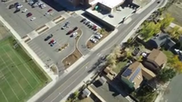 HIDDEN LAKE COLORADO-2016: Aerial View From A Helicopter Of A Semi-Empty Parking Lot