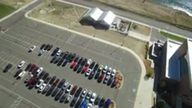 HIDDEN LAKE COLORADO-2016: Aerial View Of A Parking Lot Near A Body Of Water