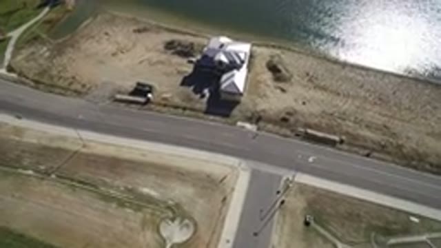 HIDDEN LAKE COLORADO-2016: Aerial View Of A House Near A Lake And A Street