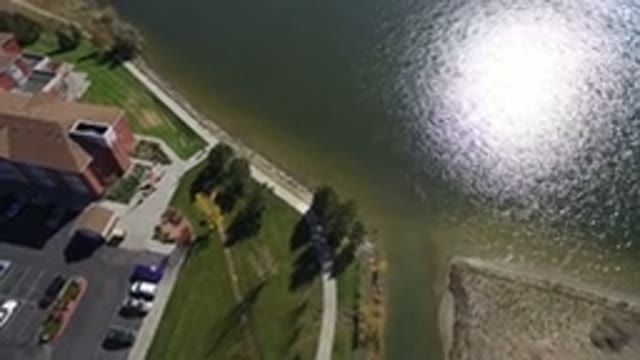 HIDDEN LAKE COLORADO-2016: Aerial View Of A Lakeside Inn And A Beautiful Lawn