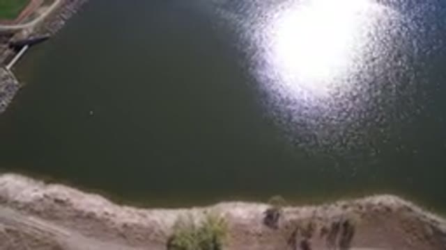 HIDDEN LAKE COLORADO-2016: Aerial View Of A Man-Made Lake, Beach, Rocks And Trees