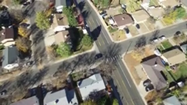 HIDDEN LAKE COLORADO-2016: Top View From A Suburbia Neighborhood A Single Car