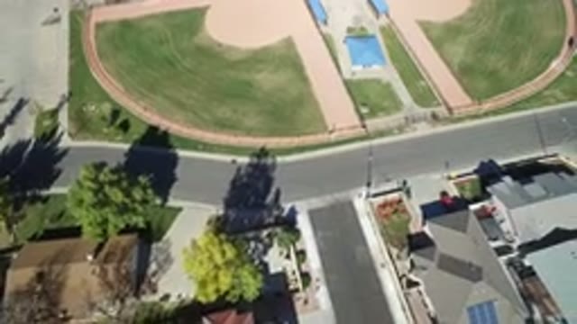 HIDDEN LAKE COLORADO-2016: Drone Flying And Filming A Village With A Park With