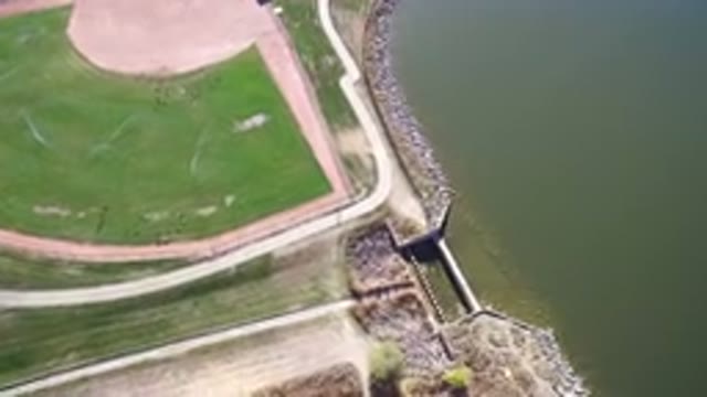 HIDDEN LAKE COLORADO-2016: Drone Image Of A Sports Field And A Beautiful Lake
