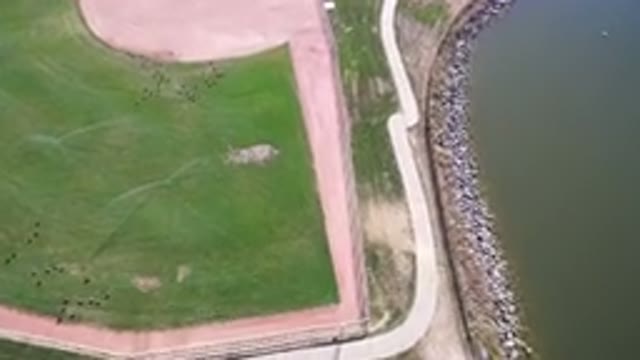 HIDDEN LAKE COLORADO-2016: Aerial View Of A Green Field And Road