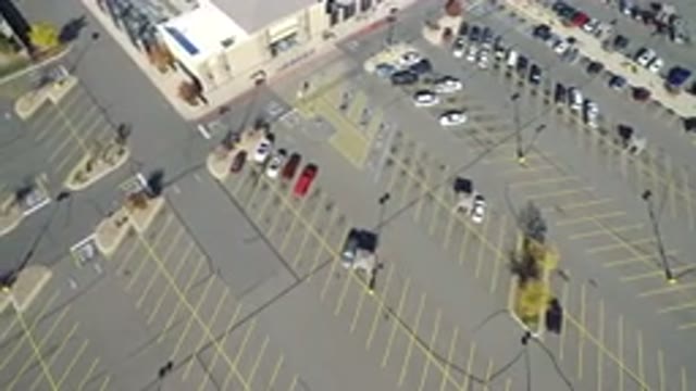 HIDDEN LAKE COLORADO-2016: View From The Top Of A Building View Of Some Cars In