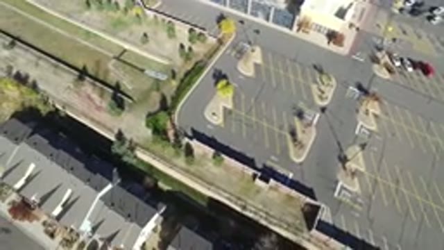 HIDDEN LAKE COLORADO-2016: Aerial View Over Car Parks Buildings And Grassy