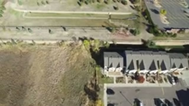 HIDDEN LAKE COLORADO-2016: Building With Parking Lot Containing Parked Cars Near