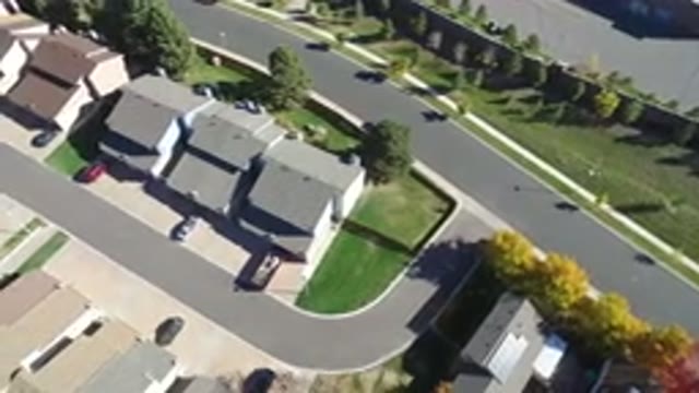 HIDDEN LAKE COLORADO-2016: Aerial View Of Several Houses With Trees And Green