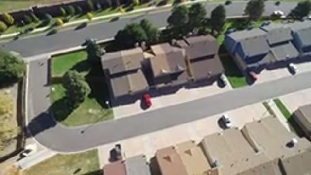 HIDDEN LAKE COLORADO-2016: Drone Camera Flying Over Neighborhood Street