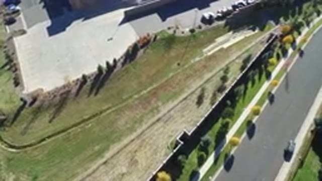 HIDDEN LAKE COLORADO-2016: Aerial Footage Panning a Parking Lot Near a Road