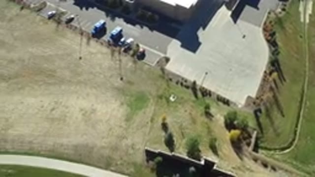 HIDDEN LAKE COLORADO-2016: Aerial View Of Parking Lot Next To Wide Grassy Space