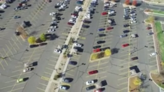 HIDDEN LAKE COLORADO-2016: Drone Video From The Top Of A Parking Lot With Many Cars