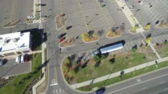 HIDDEN LAKE COLORADO-2016: Aerial View Of Traffic Turning From A Street Into A