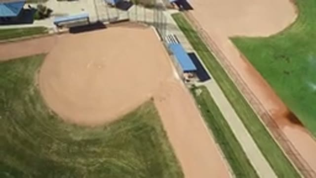 HIDDEN LAKE COLORADO-2016: Green Grassy Baseball Field On A Sunny Day