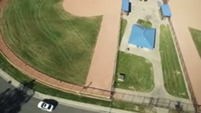 HIDDEN LAKE COLORADO-2016: Beautiful Aerial View Of A Green Grassy Baseball Field