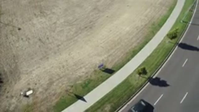 HIDDEN LAKE COLORADO-2016: Drone Flying Across A Highway With Minimal Traffic