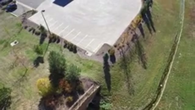 HIDDEN LAKE COLORADO-2016: An Aerial View Of An Empty Parking Lot And A Nearby