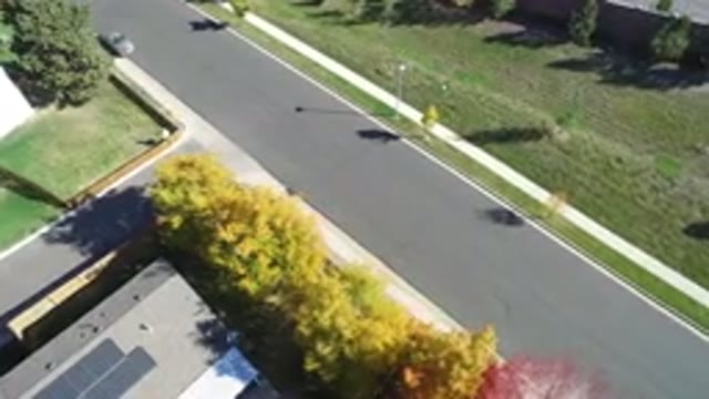 HIDDEN LAKE COLORADO-2016: Passing Over Suburban Rooftops And Road With Autumn