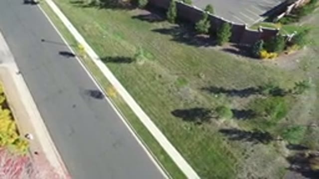 HIDDEN LAKE COLORADO-2016: Aerial Footage Of A Grassy Field Near A Parking Lot