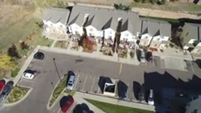 HIDDEN LAKE COLORADO-2016: Above View Of Suburban Background With Multiple Cars