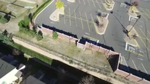 HIDDEN LAKE COLORADO-2016: Flying From Left To Right Over An Empty Parking Lot